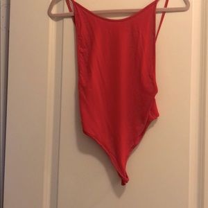 Red bodysuit with openings on side